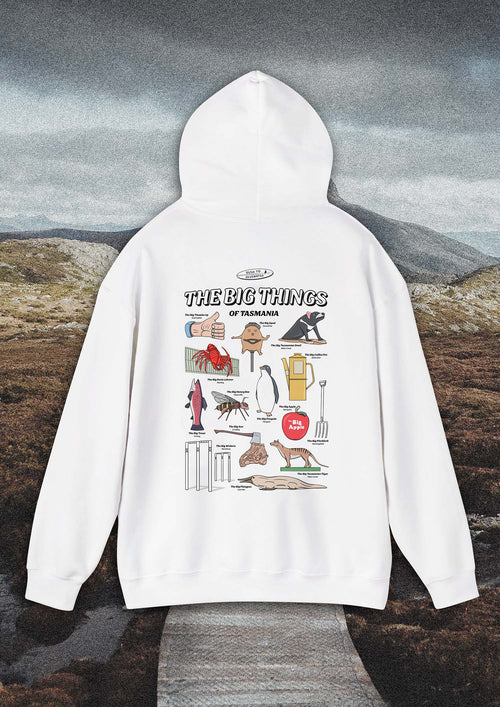 White hoodie with cartoons of 14 big landmarks and roadside attractions of tasmania. The hoodie image is cut out and placed over a hoodie landscape of Tasmania