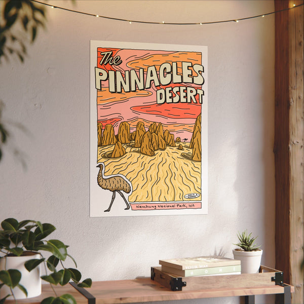 Poster placed on a wall of a vintage cartoon illustration of the Pinnacles Desert in Western Australia. Featuring black outlined rock formations, a sihlouette of a kangaroo and an emu in the bottom left corner.